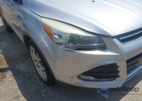 2013 Ford Escape Titanium z USA, uszkodzony, nr VIN 1FMCU9J94DUD89271